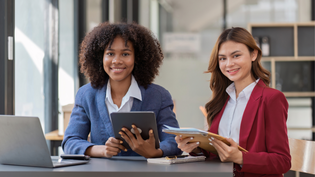 An image of a local Woodstock CPA who is meeting with her entrepreneur client to discuss bookkeeping strategies for the coming year.